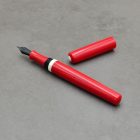 P52 töltőtoll, Tűzpiros gyanta, Varacskos disznó agyar gyűrű